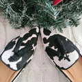 Orielle | Cow Print Loafers With Tassels